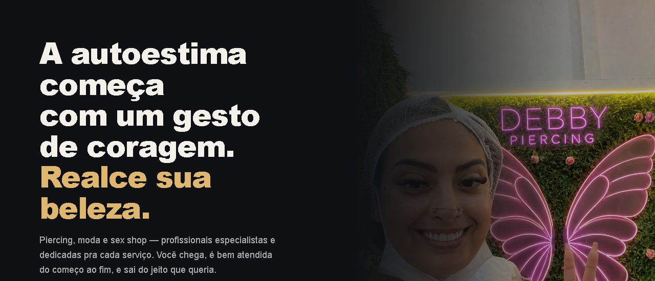 Site do Estúdio da Debby Piercing no ar: título “A autoestima começa com um gesto de coragem” e botões para ver os serviços e como chegar